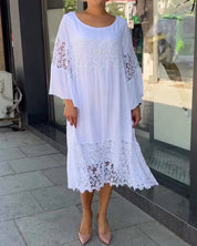 Witte zomerse jurk in de kleur Wit voor dames in stijl ideaal voor de lente.